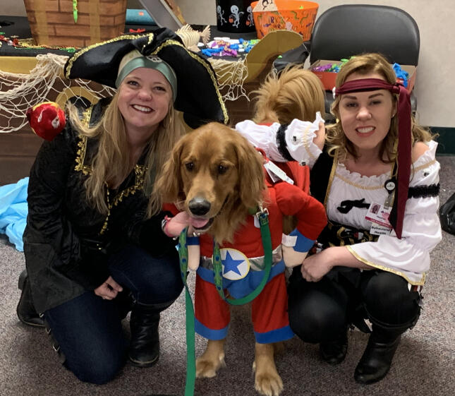 Costumed Women with Super Cooper